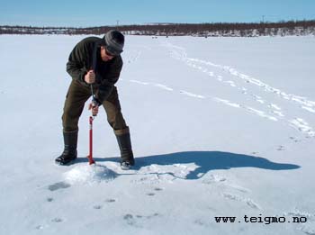 drilling hole in ice